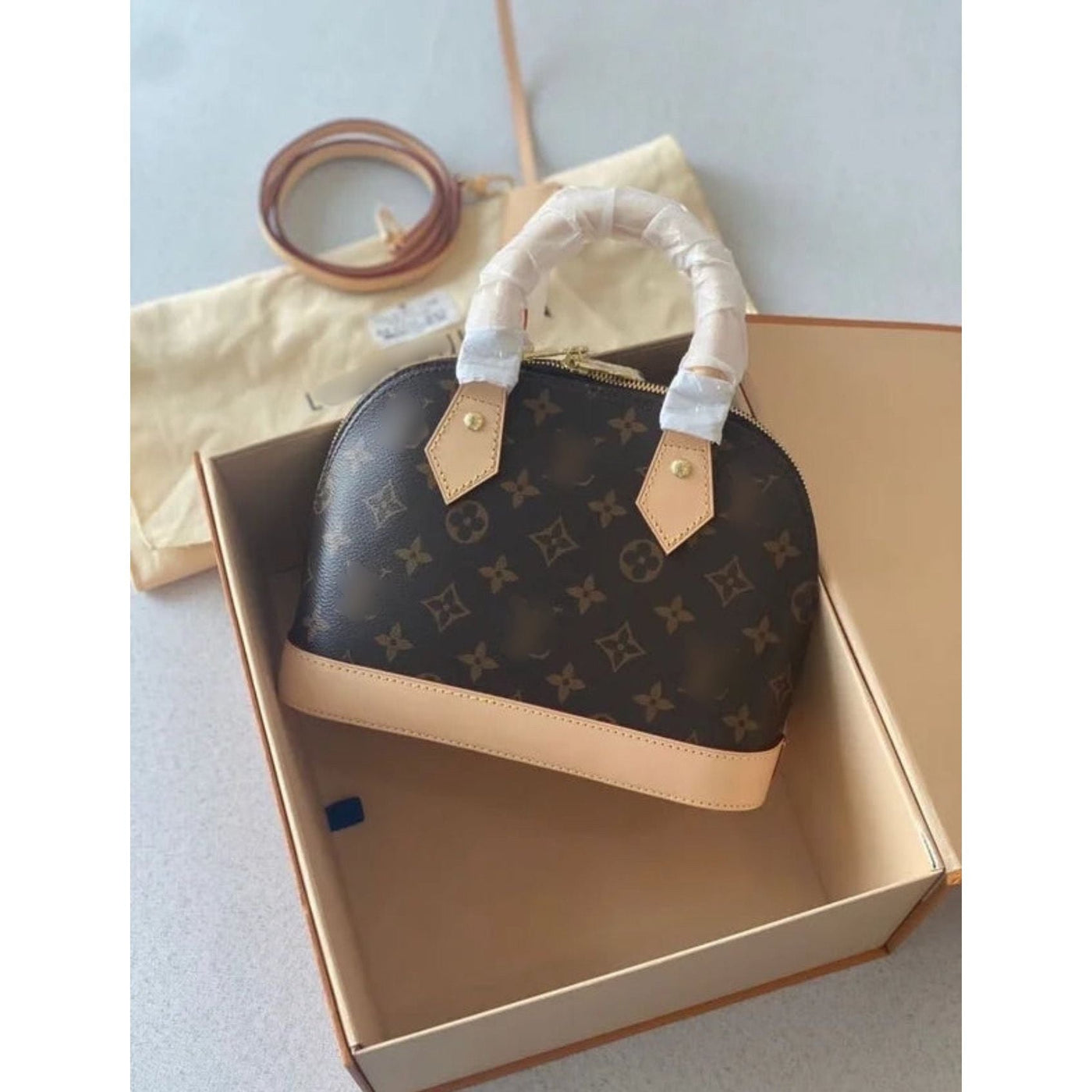 LV alma bag